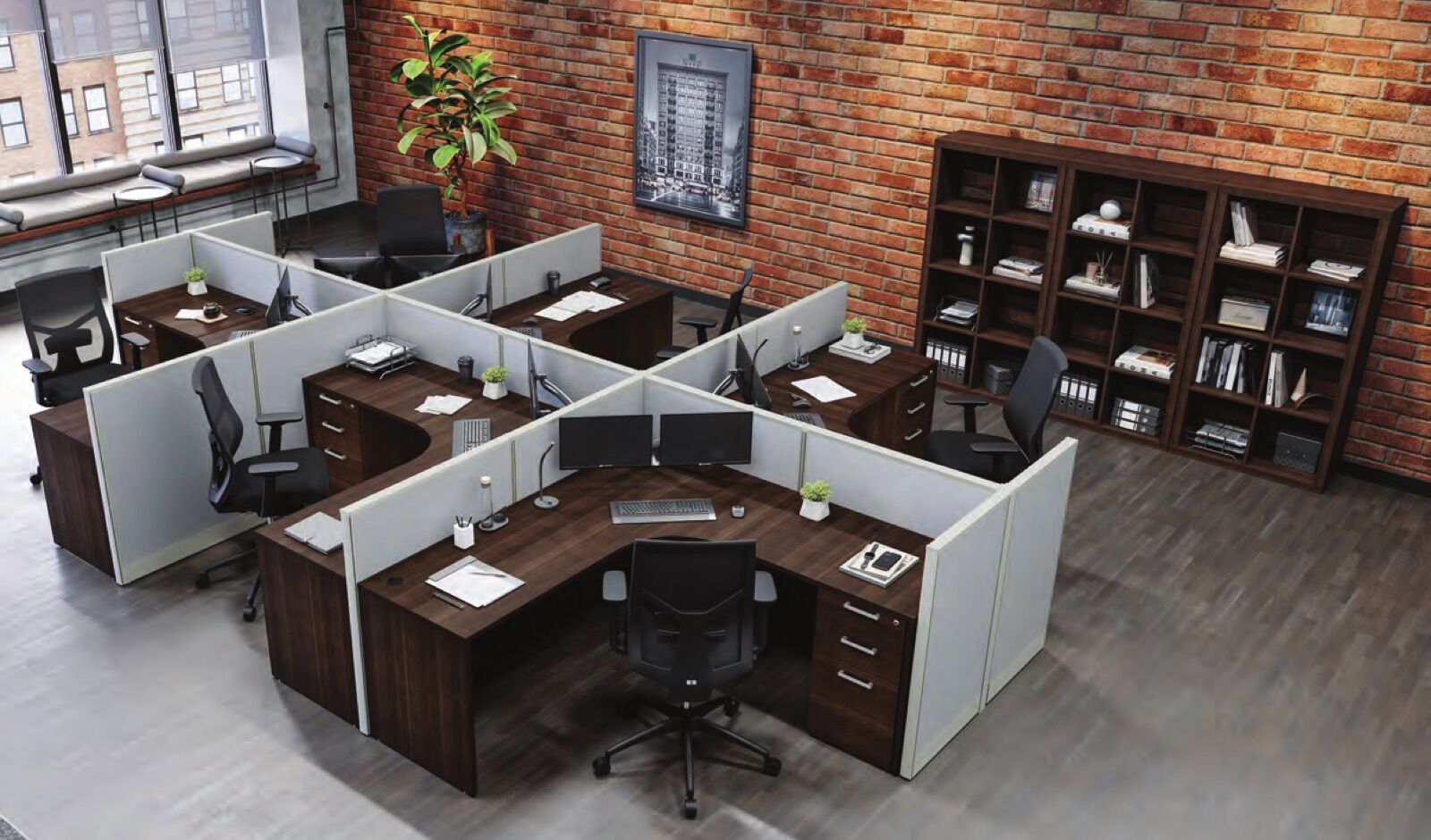 Loft office with six low-panel L-shaped workstations behind 42-inch gray fabric walls, sightlines open across the room